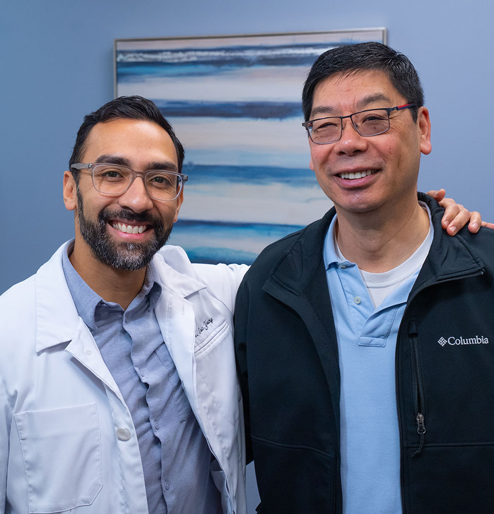 dr with dental implant patient