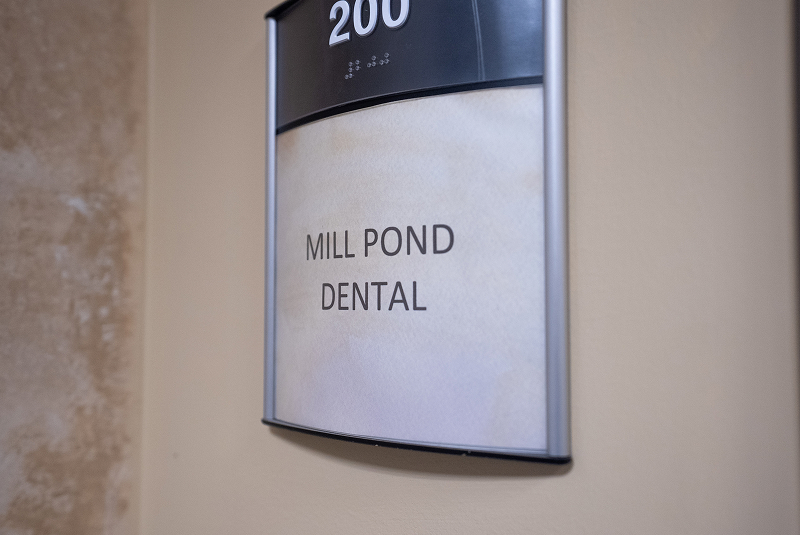 Office sign in building hallway